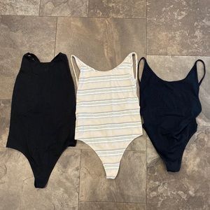 3 thong bodysuits.